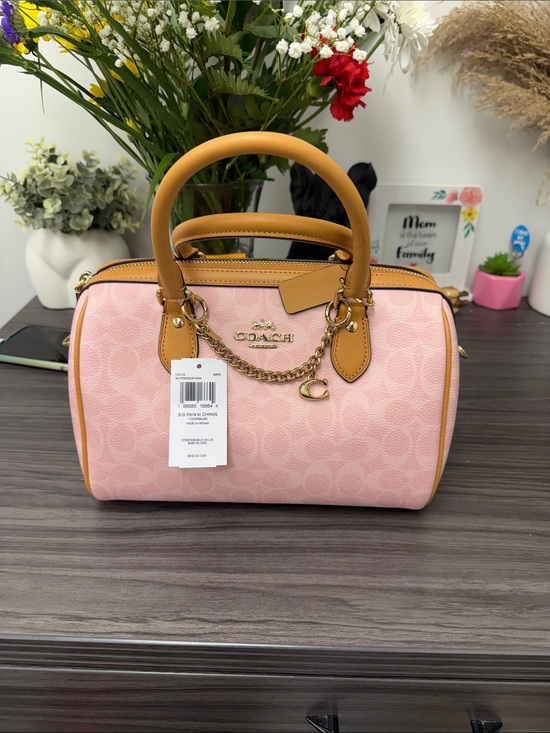 Coach Handbags - Coach Powder Pink Signature Canvas Rowan Satchel with Tan Leather Trim. Medium.